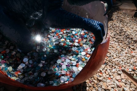 brightly colored pebbles are part of the decor of the dinosaur fun house