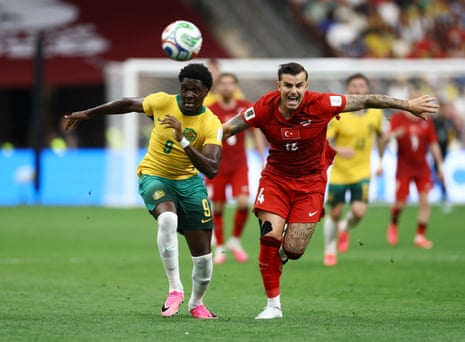 Australia's Mohamed Toure in action with Turkey's Abdulkerim Bardakci