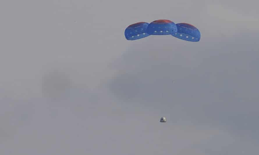 Blue Origin’s New Shepard capsule parachutes safely down to the launch area, near Van Horn, Texas, on Tuesday. - 2876 - Jeff Bezos hails ‘best day ever’ after successful Blue Origin space flight | Jeff Bezos