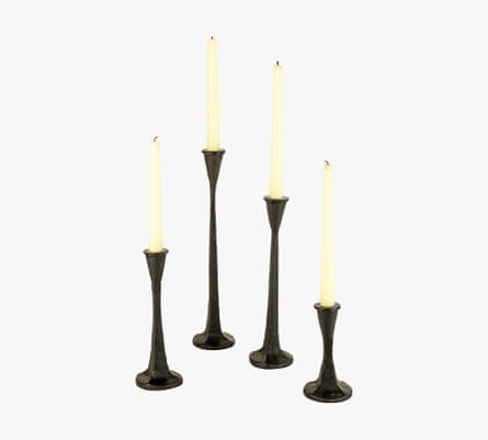 four candles in candlesticks