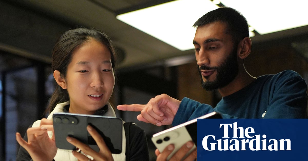 iPhone Duo owners report cracks in Apple’s first foldable handset - The Guardian
