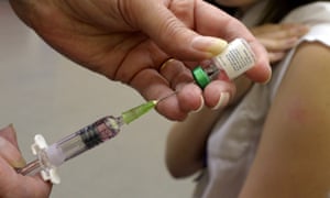 A measles vaccination being administered. 3500.jpg?width=300&quality=85&auto=forma