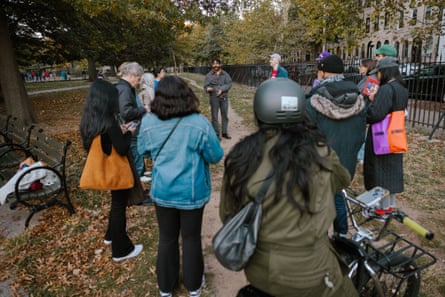 A group of volunteers gathers in a circle