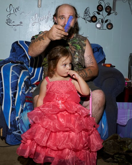 West Columbia, West Virginia, 2023, Pat with his daughter Vicky, who wears a voluminous pink dress.