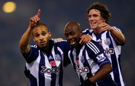 Peter Odemwingie (left) celebrates a goal for West Brom