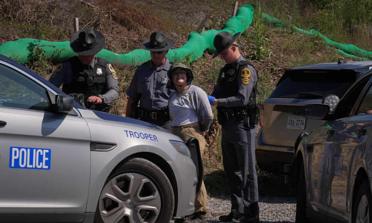 US climate scientist risks felony by chaining herself to pipeline drill US climate scientist risks felony by chaining herself to pipeline drill