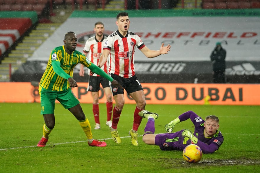 Aaron Ramsdale of Sheffield United saves a shot from Mbaye Diagne of West Bromwich Albion at Bramall Lane.