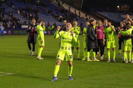 Adrian Segecic, the Portsmouth scorer, celebrates in front of the travelling fans after the 1-0 win at Sheffield Wednesday.