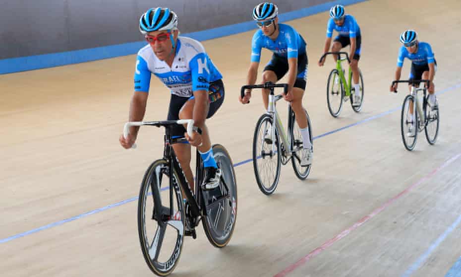 Sylvan Adams with members of his team Start-Up Nation at his velodrome in Tel Aviv in June 2020.