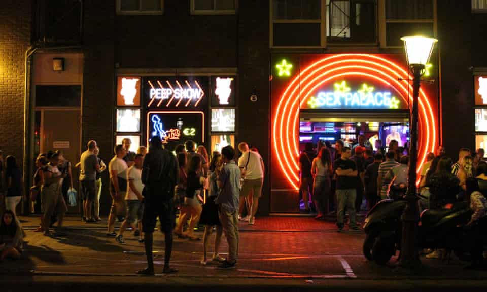 Tourists outside live sex shows in central Amsterdam.