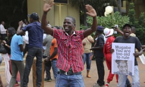 Zimbabweans celebrate in Harare after the resignation of Mugabe.