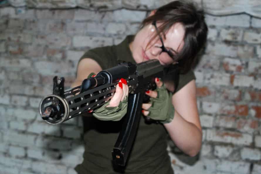 A woman learns how to use a Kalashnikov assault rifle in Zaporizhzhia, southeastern Ukraine, during a security training programme aimed at teaching women to use guns and instructing them in urban combat tactics.