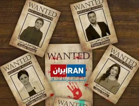 Pouria Zeraati on a wanted poster along with those of other journalists