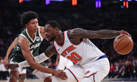 New York Knicks forward Julius Randle (30) dribbles against Milwaukee Bucks forward MarJon Beauchamp (3) during the first half on Monday at Madison Square Garden.