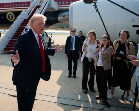 Donald Trump gestures as he speaks with reporters before boarding the new Air Force One, 1 July 2026.