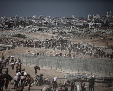 Palestinians carry the limited aid