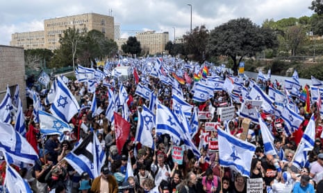 Israelis protest near the Supreme Court during a demonstration.