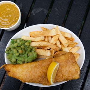 Fish, chips mushy peas, wedge of lemon, pleasingly orange curry sauce at Angel Lane Chippie.