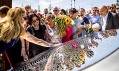 Relatives of those who died on MH17 attend the unveiling ceremony a monument to victims near Amsterdam’s Schiphol airport.