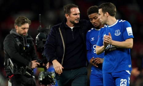 Everton manager Frank Lampard consoles his players after the final whistle.