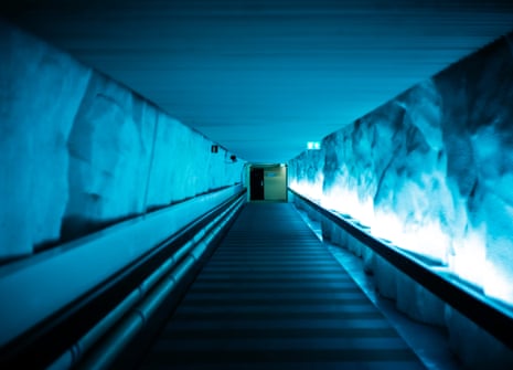 A dimly lit underground tunnel under a hotel in Helsinki.