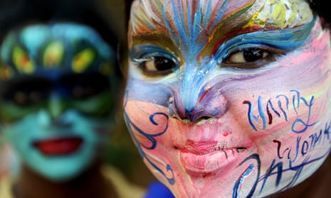 Students with their faces painted at a college in Chennai, India, on the eve of International Women’s Day. 
