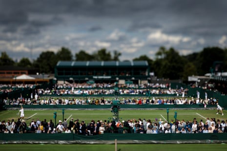 Action on Court Nine as Lloyd Harris of South Africa plays Grégoire Barrère of France