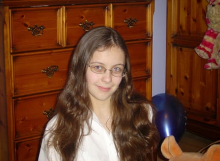 Amelia Tait aged 13 in 2006, with long brown wavy hair and glasses
