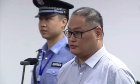 Taiwanese activist Lee Ming-cheh appearing in court in Yueyang in China’s central Hunan province.