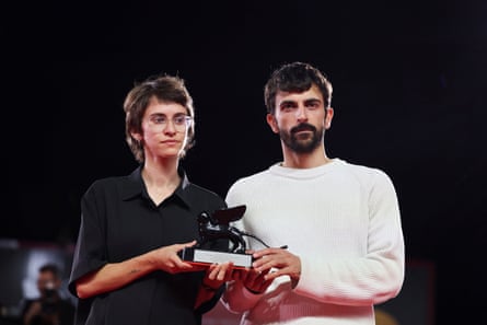NAZA directors Yuval Abraham and Rachel Szor hold their Special Jury Award at the 83rd Venice International Film Festival