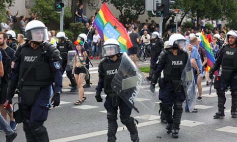 Riot police protect participants of the first equality march in the Polish city of Bialystok on 20 July.
