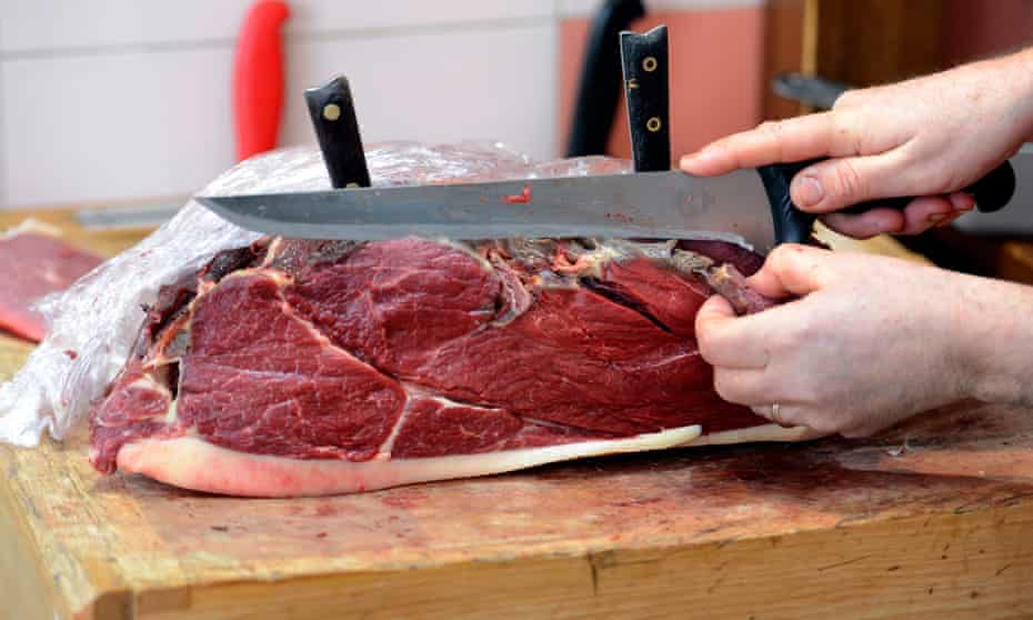 A butcher prepares horsemeat in France