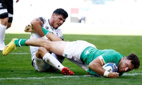 Hugo Keenan scores Ireland’s second try during the Rugby World Cup Pool B match against Romania at Stade de Bordeaux.
