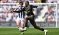 Joe Aribo of Southampton is challenged by Tom Fellows of West Bromwich Albion.