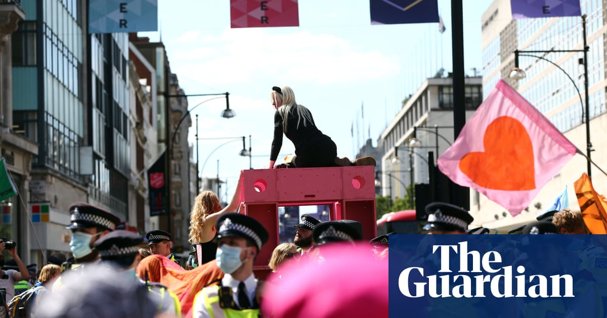 Extinction Rebellion protesters block Oxford Circus in London