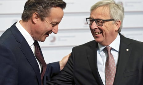 European Commission president Jean-Claude Juncker speaks to David Cameron before the Eastern Partnership summit in Riga.
