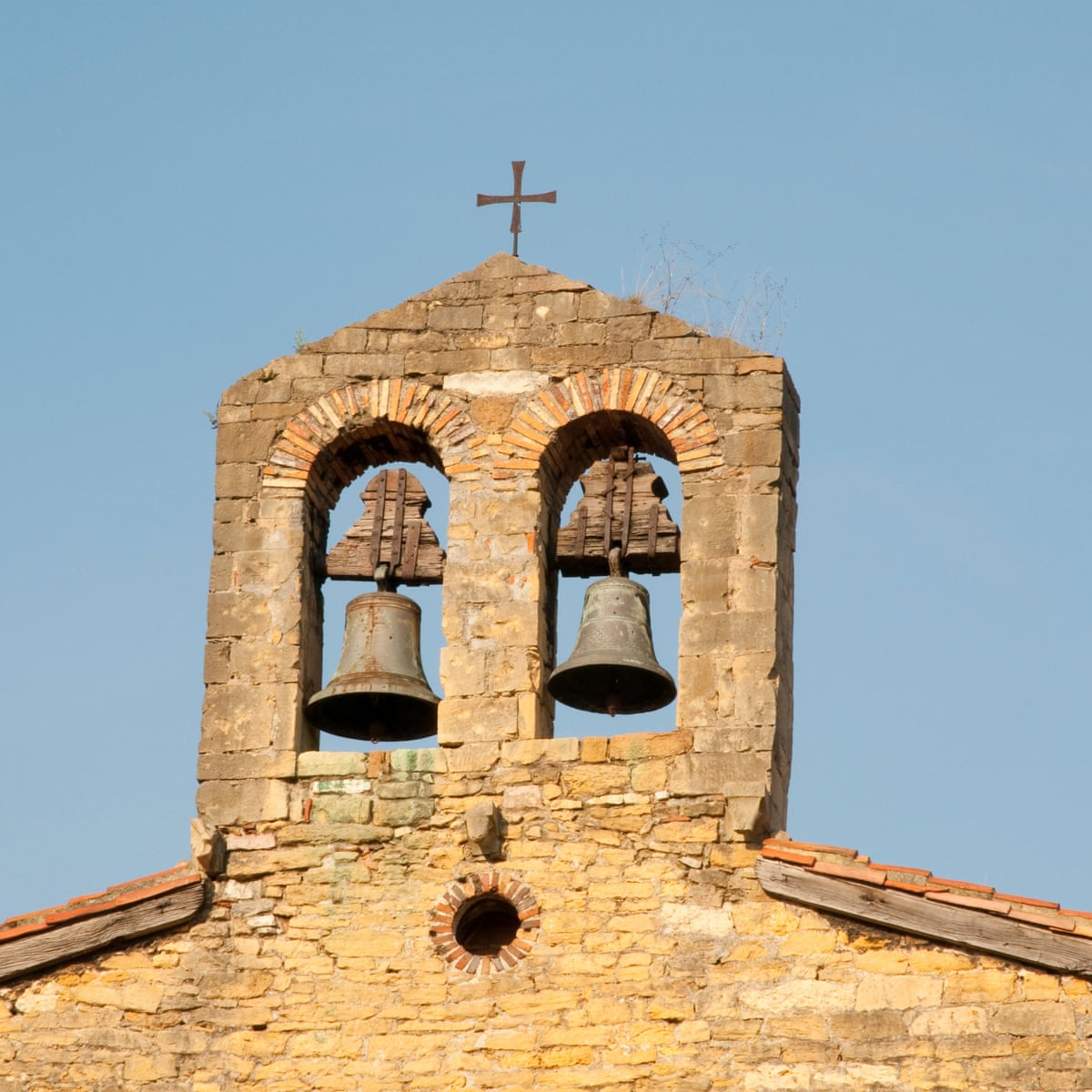 Church bells in Catalan town chime again after residents' pot