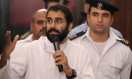 Alaa Abd el-Fattah speaking in court during his trial in Cairo in 2014.
