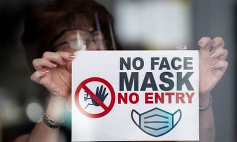 Face masks sign on shop