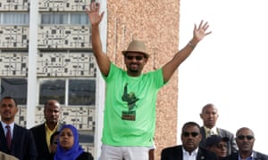 Abiy Ahmed waves to supporters at the rally