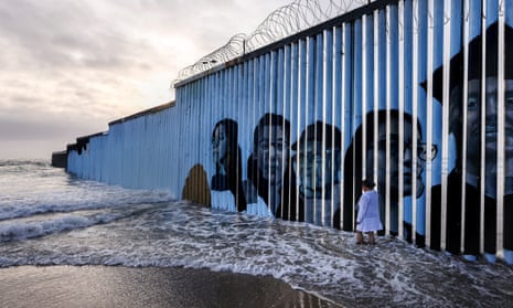 A barrier with the mural painted on it in Tijuana, by the US-Mexico border. The program is expected to be back in effect in mid-November.