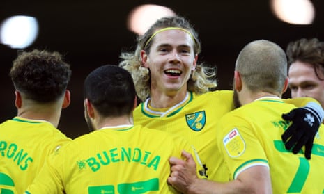 Todd Cantwell celebrates with three other key Norwich players this season, Max Aarons, Emi Buendía and Teemu Pukki, after Buendía scored in this month’s 7-0 win against Huddersfield.