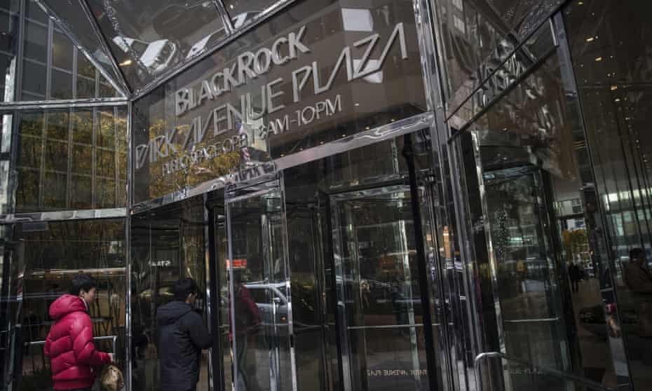 People enter BlackRock Inc headquarters in New York.