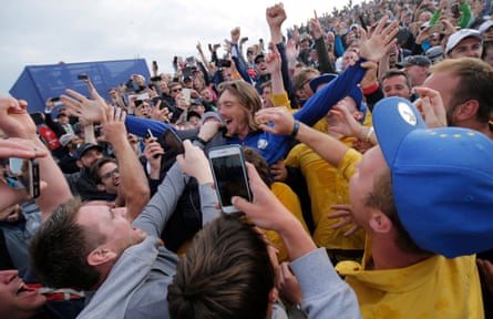 Tommy Fleetwood is mobbed by fans after his magical Ryder Cup debut ended with victory for Europe.
