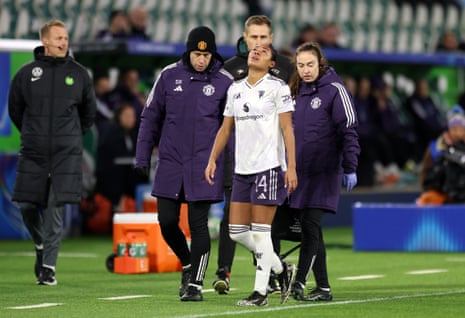 Jayde Riviere of Manchester United leaves the pitch after injuring her ankle.