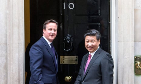 David Cameron greets Chinese president Xi Jinping at Downing Street in London.
