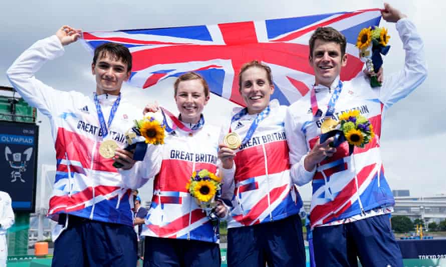 Great Britain’s Alex Yee, Georgia Taylor-Brown, Jess Learmonth and Jonny Brownlee after winning gold in the triathlon mixed relay at Odaiba Marine Park.
