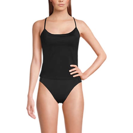A model wears Lands’ End Women’s Tugless Quick Dry Strappy Back Tankini in black