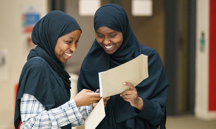 Yasmin Adan and Asmaa Ali receive their A-level results at Oasis Academy Hadley, Enfield, north London
