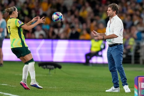 Joe Montemurro throws the ball to Steph Catley during the Women's Asian Cup final